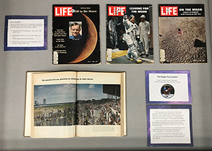 display case 2 with open Life magazines