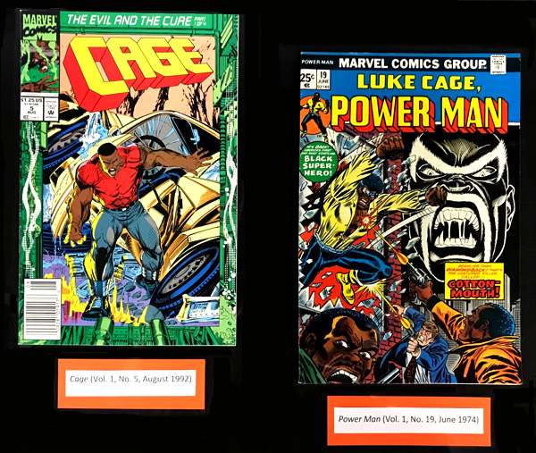 Display case with two comics: Cage(No. 2, August 1992) and Luke Cage, Power Man ((No. 19, 1974).Luke Cage