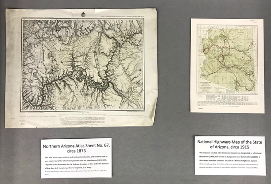 National Parks exhibit, center case with maps of Arizona, circa 1873 and 1915