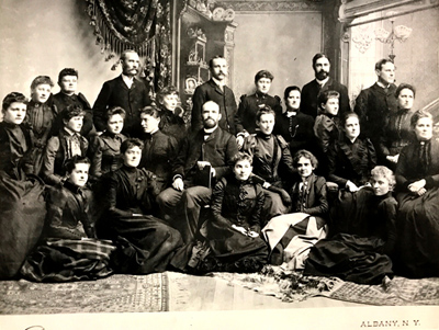 Melvil Dewey (center) with staff and students of the Library School, 1892