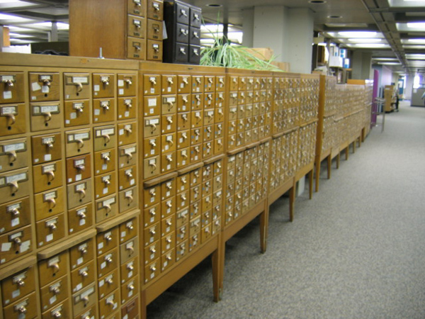 row of historic wooden card catalogs
