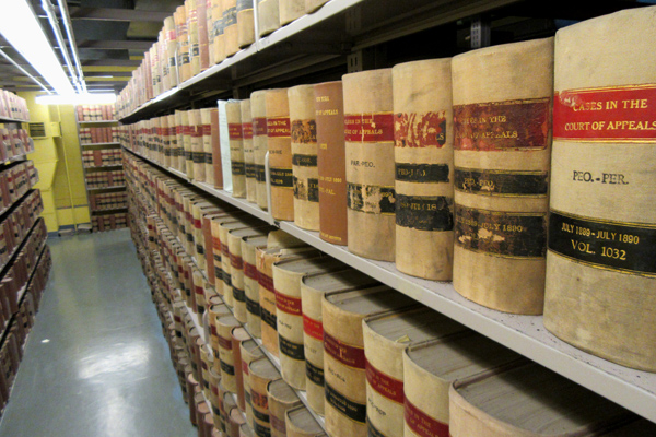 shelves of early bound records and briefs