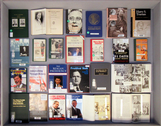 Rigth display case, with books on 20th 20th and 21st century presidents, from Coolidge to Trump