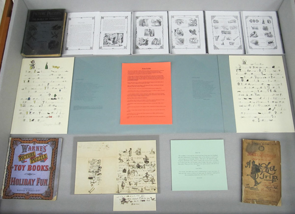 Display case 2, showing additional examples of rebuses, including the letter from the Chadwick Family Collection.